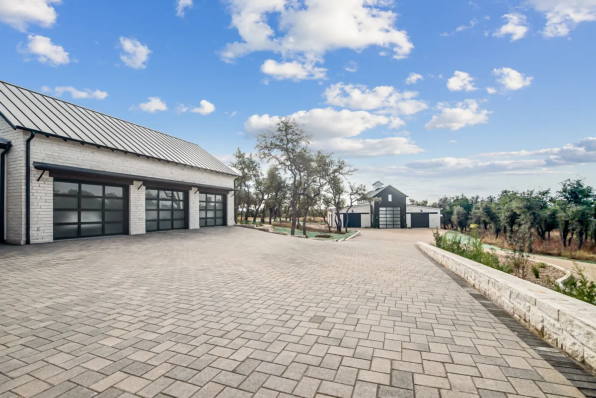 Ranch home with paver motor court